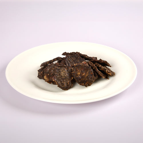 Natural cat treats made from Beef Heart, Liver and Kidney from LUNA & me on a white plate