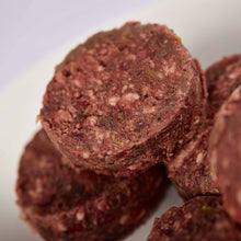 Close up of Luna's Lamb raw dog food patties