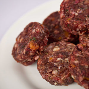 Close up of Wild Venison & Duck raw dog food patties from LUNA & me