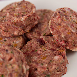Close up of Beef & Venison raw dog food patties from LUNA & me